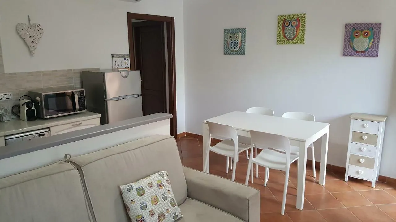 Апартаменты Casa Vacanza Porto Pino Сант'Анна-Аррези Италия